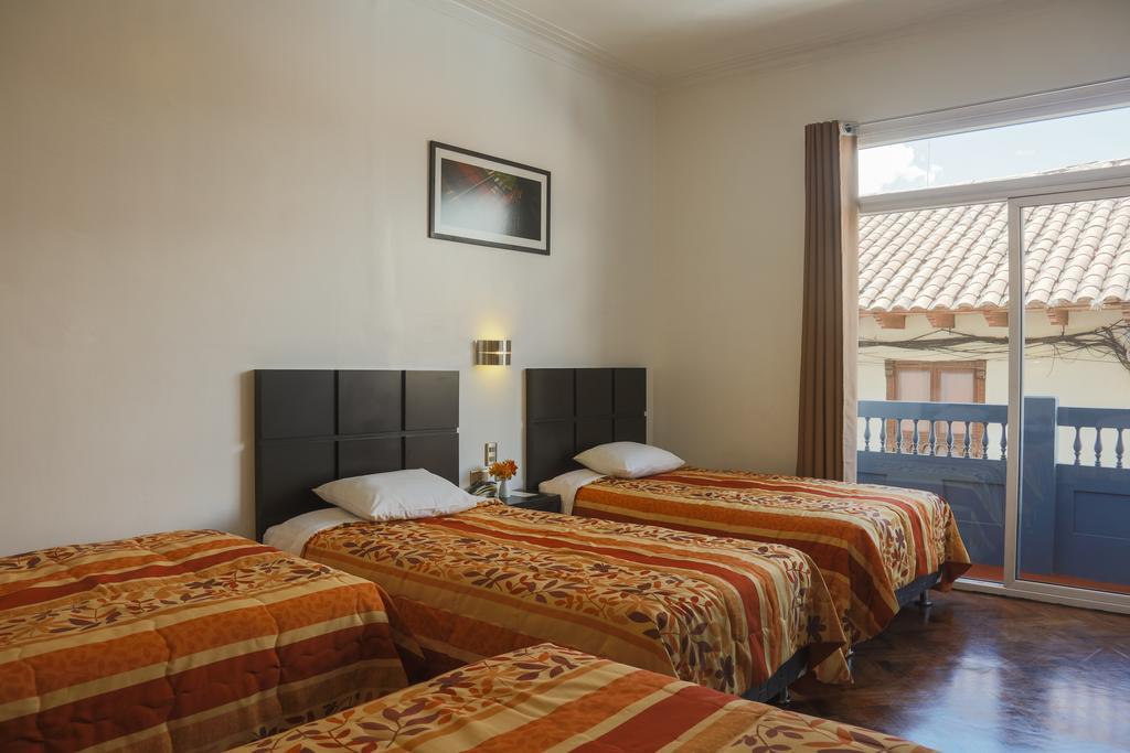 Hostal & Apartments El Triunfo Cusco Bagian luar foto