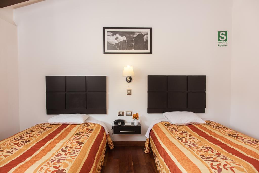 Hostal & Apartments El Triunfo Cusco Bagian luar foto